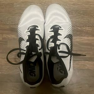 Men Nike Track Spikes (size 8) Color White and Black.